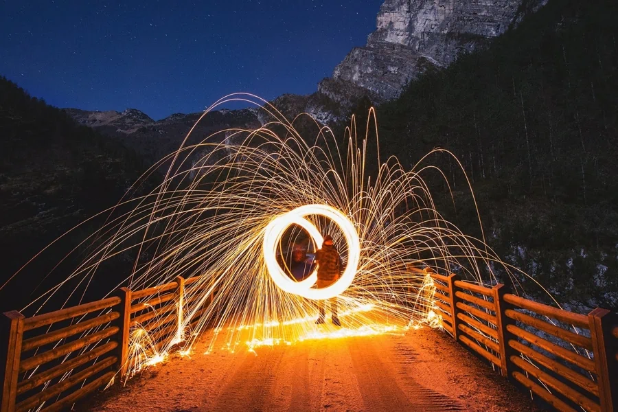 Person demonstrating light painting photography as a fun activity to do while on shrooms.